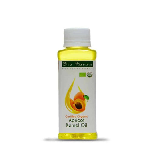Bottle of Bio Hunza Apricot Kernel Oil on a white background

